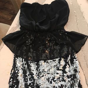 Little blank strapless dress.